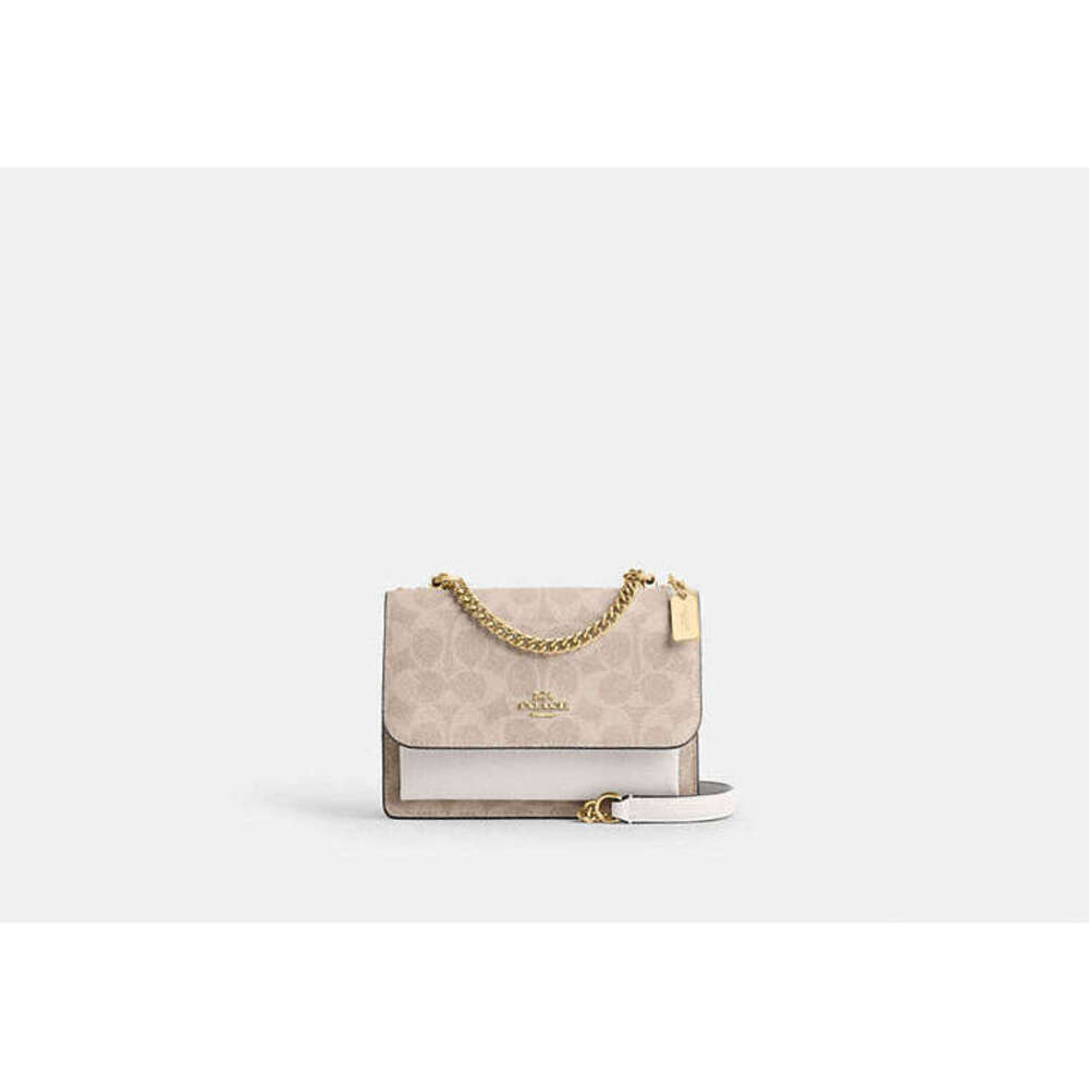 Mini Klare Crossbody Bag In Signature Canvas